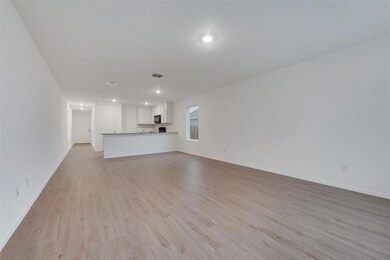 Unfurnished living room with light wood-type floor