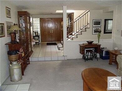 Formal living room and entry way