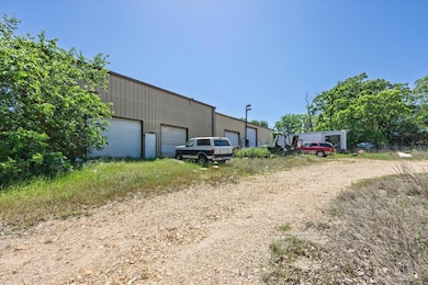 View of outdoor structure with an outbuilding