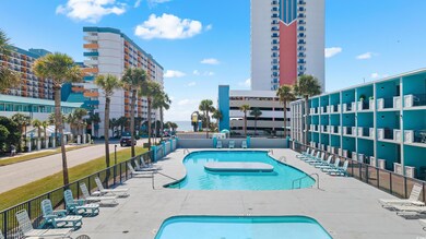 View of swimming pool with a patio