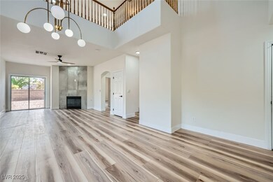 Unfurnished living room featuring a tile fireplace