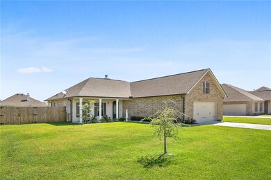 Located on a half-acre lot in the peaceful Live Oa