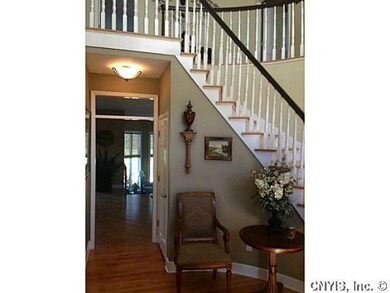 Foyer Open floor plan with formal living room, fam