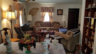 Dining room leading into the living room