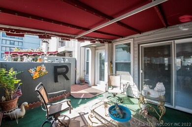 Wonderful covered front patio looking from the far