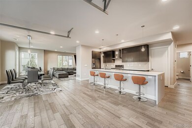 The chef's kitchen boasts high-end appliances, tons of cabinets, counterspace, and a large pantry - perfect for the home cook and entertainer!