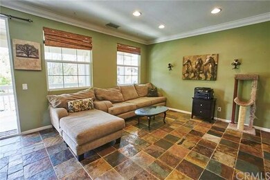 Spacious living room with dual pane windows, slate