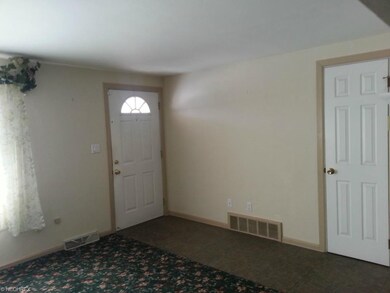 Ceramic Tile entrance greets you adjacent to Livin