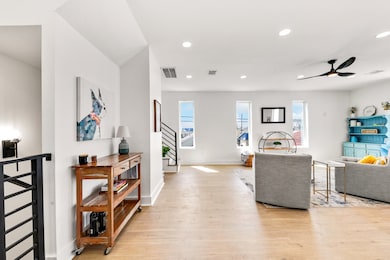 The second floor boasts a bright and airy open-con
