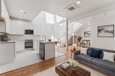 Welcome to bright light and open floor plan living/dining and kitchen - virtually staged