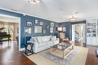 Family den with windows looking to professionally 