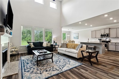 Expansive view of living area and kitchen and breakfast area