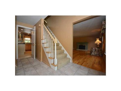 Entry/Foyer. Tile entry leads to Living room, kitc