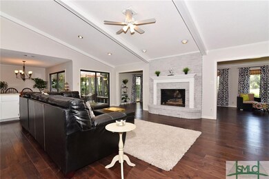 Living room: gas fire place, hardwood floors, sunr