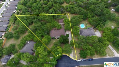 Plenty of privacy and space on this oversized cul-de-sac lot.