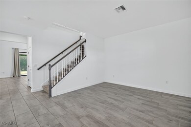 11484 Canopy Loop, Miromar Lakes, FL 33913 - photo 2