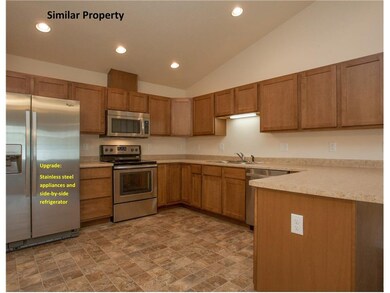 Kitchen with counter height Breakfast Bar