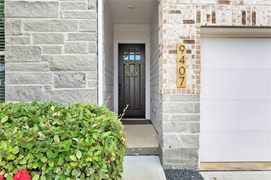 The entrance is welcoming, with a well-kept pathwa