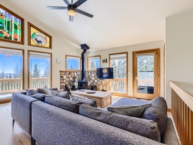 wood fireplace & vaulted ceilings