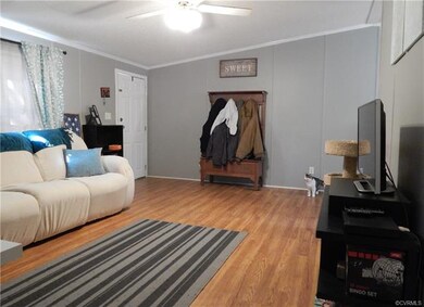 The spacious Living room, with laminate flooring a
