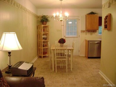 Open living room, dining area and kitchen. New flo