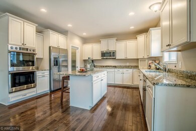 Kitchen with double oven, extensive cabinetry, rec