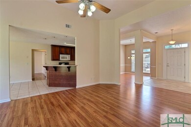 This great room has a seamless flow to the kitchen