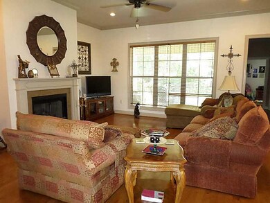 Living Room. Note large windows overlooking patio/
