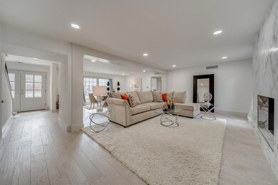 View of open formal dining & living area, french d
