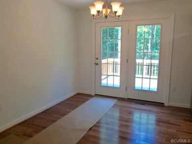 Dining Room area with hardwood floors & French Doo