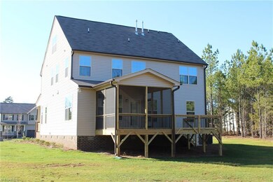 Back of Home with Covered Screened Deck + BBQ Deck
