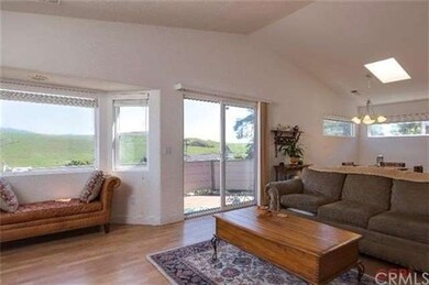 Sliding door leads to upper level deck.