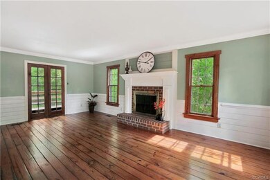 Great Room!  Hardwood floors, French doors to deck