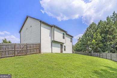 Large, Fully Fenced Backyard