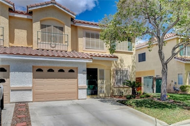Mediterranean / spanish-style home featuring concr