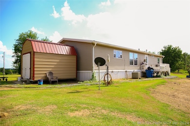 Back of home has a deck.