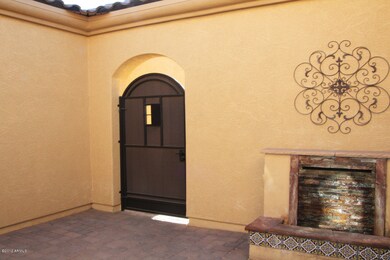 Just inside the courtyard entryway!
