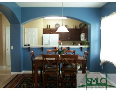 Breakfast Area. Eating area open to family room.