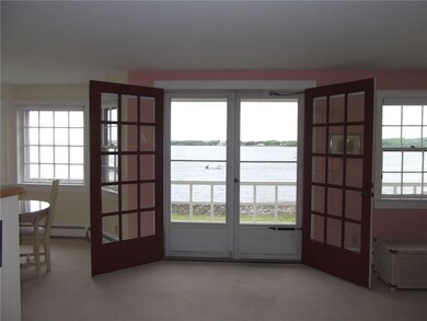 French doors open to lawn and water beyond.  A per