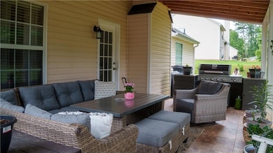 View of patio / terrace featuring outdoor lounge area, grilling area, and outdoor dining area