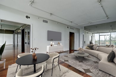 Open floor plan of living and dining room off the