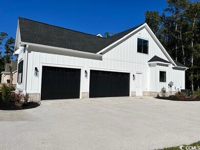 View of home's exterior featuring central AC and a