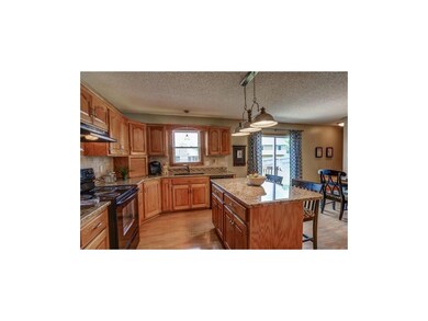 Solid granite counters, trendy backsplash, newer l