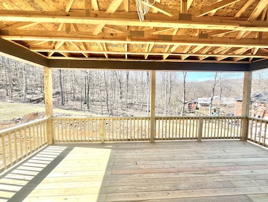 Stock photo. Your's will be a concrete covered porch with wood burning fireplace