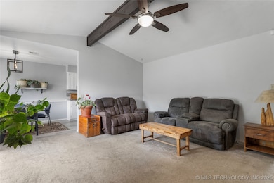 Spacious living room with gas fireplace.