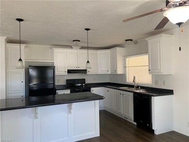 Beautiful  Kitchen with lots of cupboards and a hu
