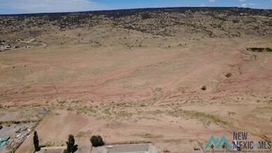 Aerial view of property and surrounding area with rural landscape and a desert landscape