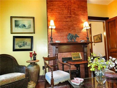 Original Floor to Ceiling Fireplace has been Refii