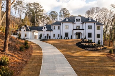 French country style house with stucco siding and 