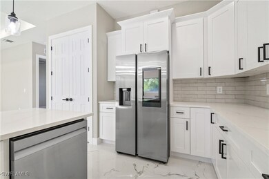 Kitchen with visible vents, marble finish floor, s